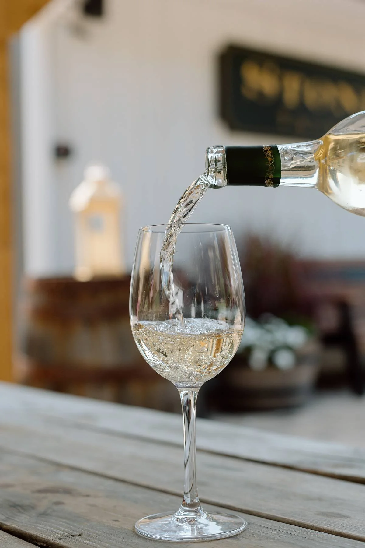 White wine poured into a glass
